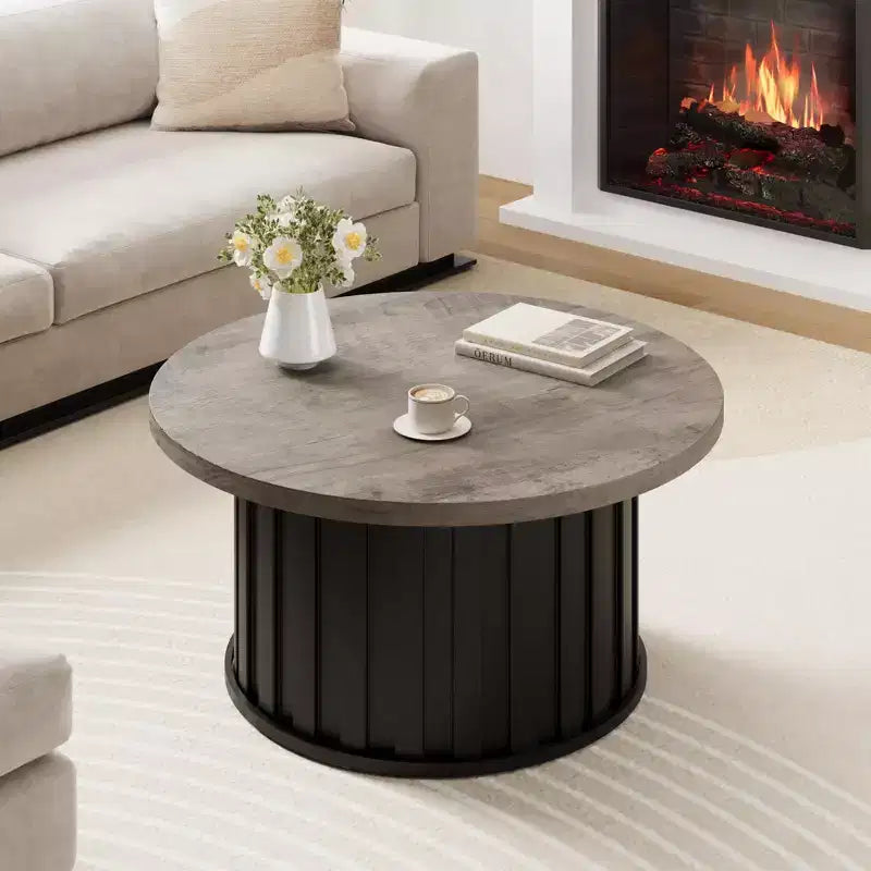 Tavolino rotondo con base in metallo